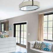 eplacement windows Los Angeles, CA bright living room with black-framed windows