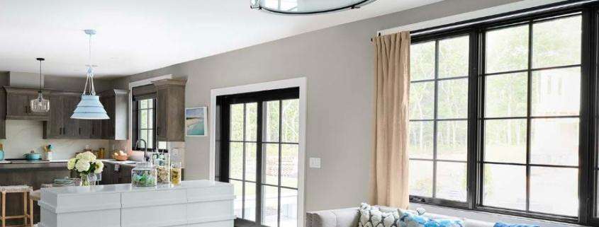 eplacement windows Los Angeles, CA bright living room with black-framed windows