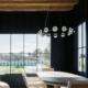 replacement windows Orange County, CA modern dining room with large black-framed windows