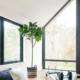 modern room with large black-framed replacement windows in Orange County, CA