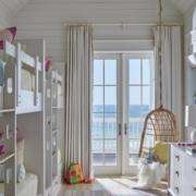 replacement-doors-orange-county-ca-with-white-french-patio-doors-opening-to-an-ocean-view Replacement doors Orange County, CA with white French patio doors opening to an ocean view