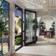 Open glass replacement doors in Los Angeles, CA, designed to maximize outdoor views